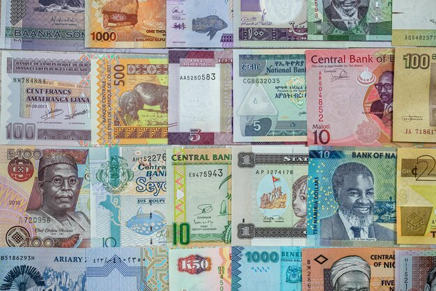 closeup african currency various colors shapes denominations filled entire table 359031 34869 1